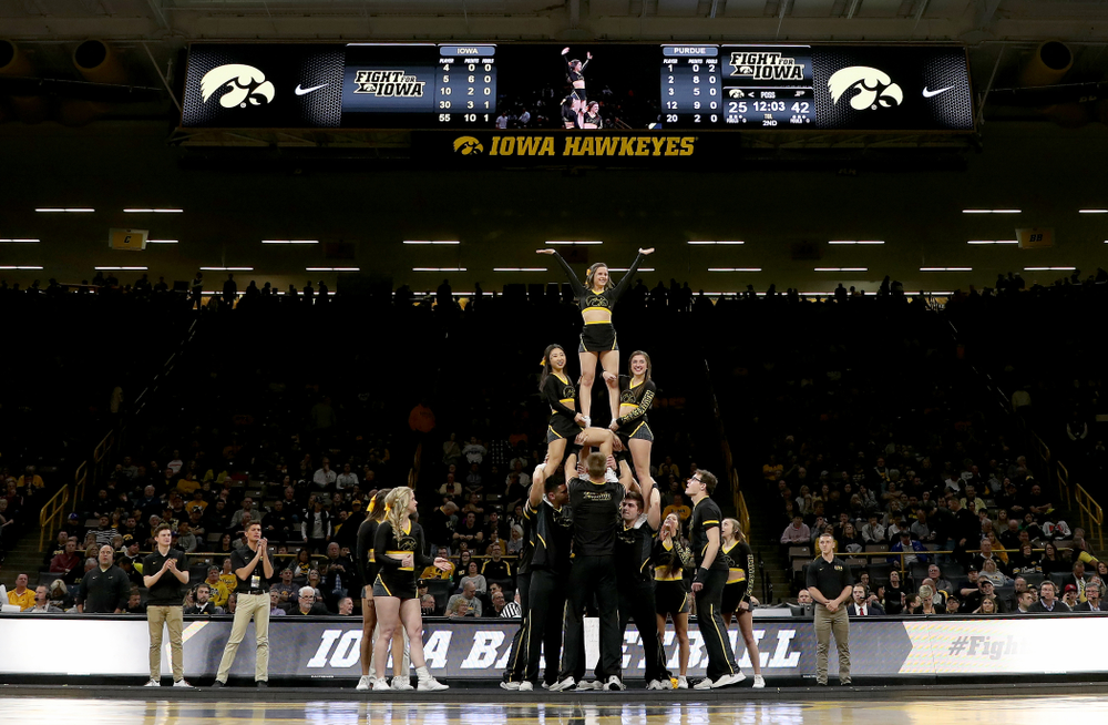 The Iowa Cheerleaders and Dance Team perform on senior night at half-time of the Iowa Hawkeyes game against the Purdue Boilermakers Tuesday, March 3, 2020 at Carver-Hawkeye Arena. (Brian Ray/hawkeyesports.com)