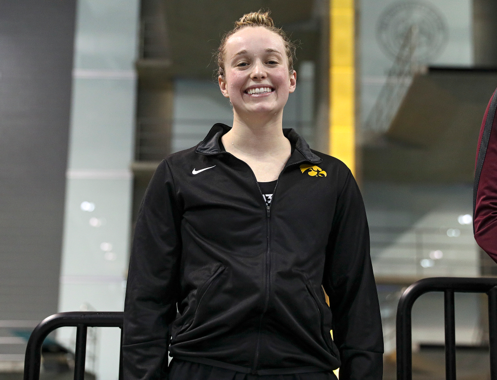 Iowa’s Kelsey Drake on the awards stand after swimming the women’s 100 yard butterfly final event during the 2020 Women’s Big Ten Swimming and Diving Championships at the Campus Recreation and Wellness Center in Iowa City on Friday, February 21, 2020. (Stephen Mally/hawkeyesports.com)