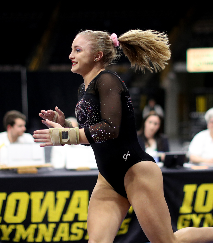 Iowa’s Lauren Guerin competes on the vault against Michigan Friday, February 14, 2020 at Carver-Hawkeye Arena. (Brian Ray/hawkeyesports.com)
