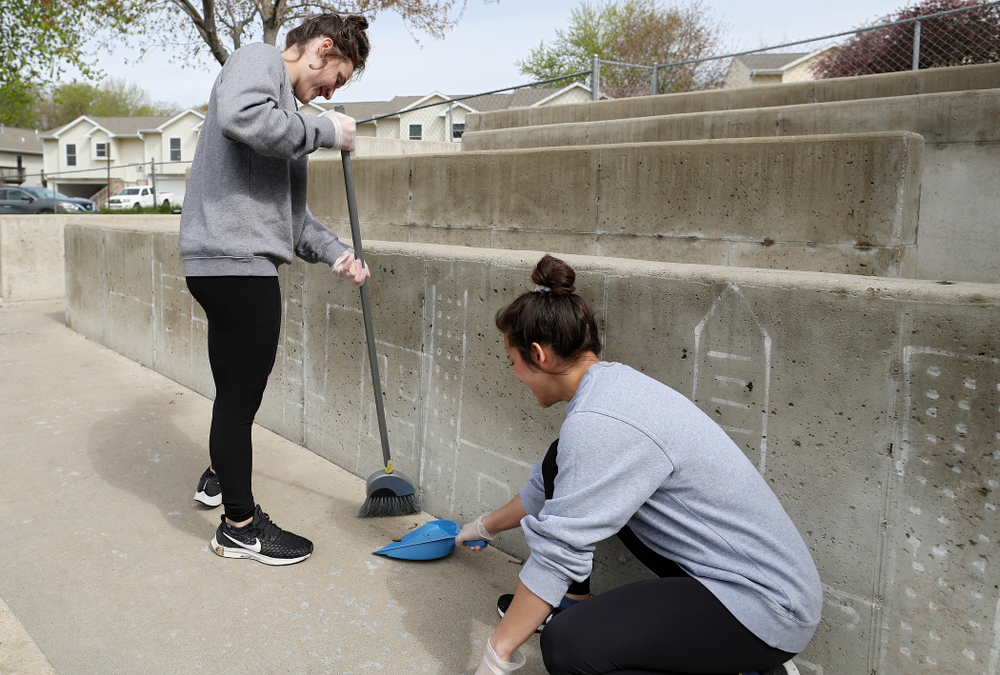 Iowa women's gymnasts clean outside Handicare during the 21st annual ISAAC Hawkeye Day of Caring in Coralville on Sunday, Apr. 28, 2019. (Stephen Mally/hawkeyesports.com)