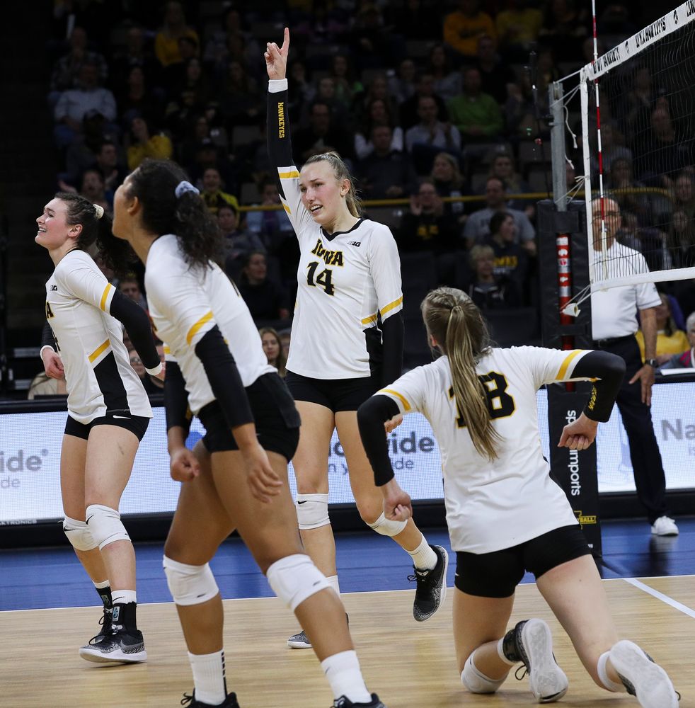 Iowa Hawkeyes outside hitter Cali Hoye (14) celebrates after winning a point during a match against Penn State at Carver-Hawkeye Arena on November 3, 2018. (Tork Mason/hawkeyesports.com)