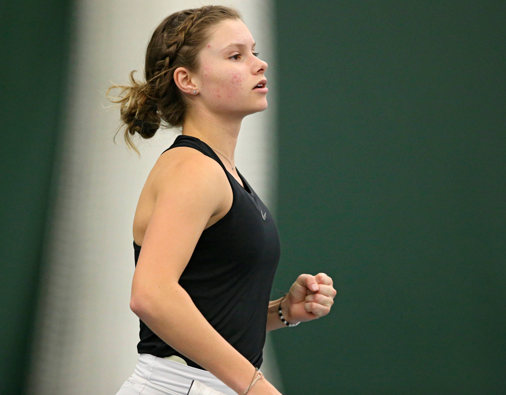 Iowa's Cloe Ruette pumps her fist as she celebrates a point during their doubles match against Indiana at the Hawkeye Tennis and Recreation Complex in Iowa City on Sunday, Mar. 31, 2019. (Stephen Mally/hawkeyesports.com)