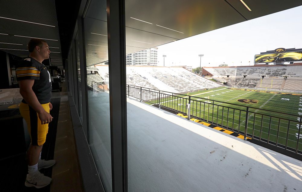 Iowa Hawkeyes quarterback Nate Stanley (4) looks at the field from the new Ted Pacha Family Club at Kinnick Stadium in Iowa City on Friday, Aug 9, 2019. (Stephen Mally/hawkeyesports.com)