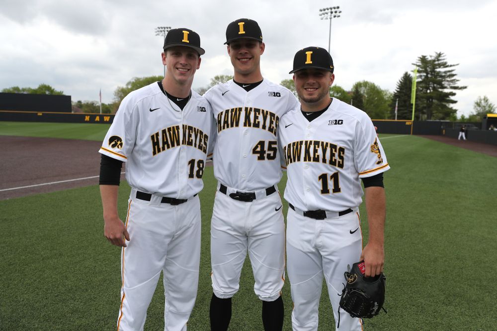 Iowa Hawkeyes Shane Ritter (18), Kyle Shimp (45), and Cole McDonald (11) before their game against Michigan State Sunday, May 12, 2019 at Duane Banks Field. (Brian Ray/hawkeyesports.com)