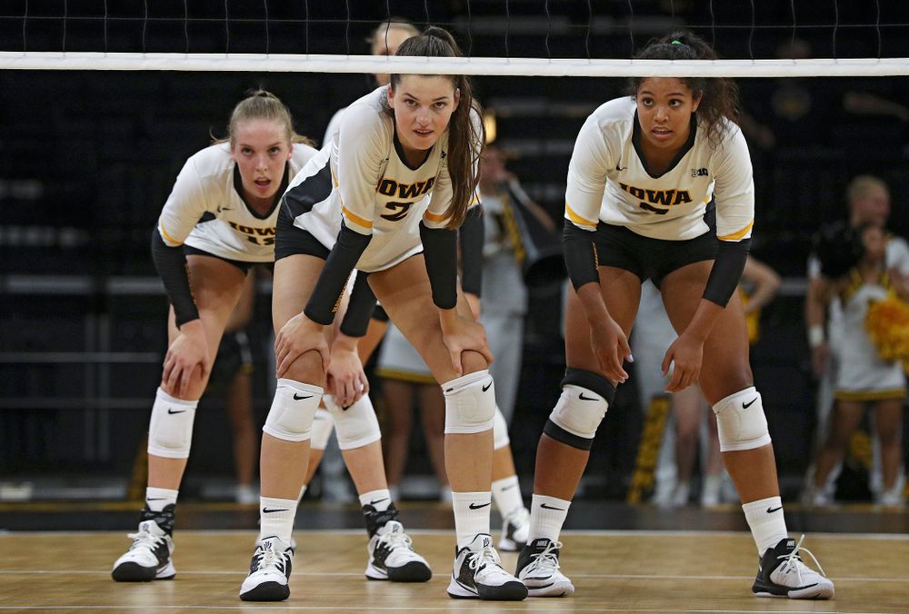 Iowa’s Hannah Clayton (18), Courtney Buzzerio (2), and Brie Orr (7) wait for a serve during the third set of their Big Ten/Pac-12 Challenge match against Colorado at Carver-Hawkeye Arena in Iowa City on Friday, Sep 6, 2019. (Stephen Mally/hawkeyesports.com)