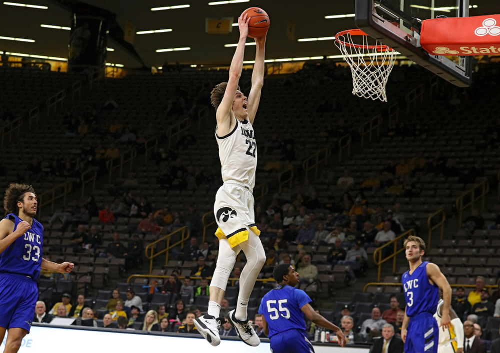 Iowa Hawkeyes forward Patrick McCaffery (22) dunks the ball during the second half of their exhibition game against Lindsey Wilson College at Carver-Hawkeye Arena in Iowa City on Monday, Nov 4, 2019. (Stephen Mally/hawkeyesports.com)