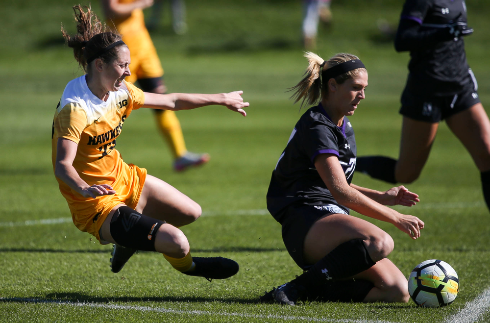 Iowa Hawkeyes midfielder Josie Durr (25) is fouled during a game against Northwestern at the Iowa Soccer Complex on October 21, 2018. (Tork Mason/hawkeyesports.com)