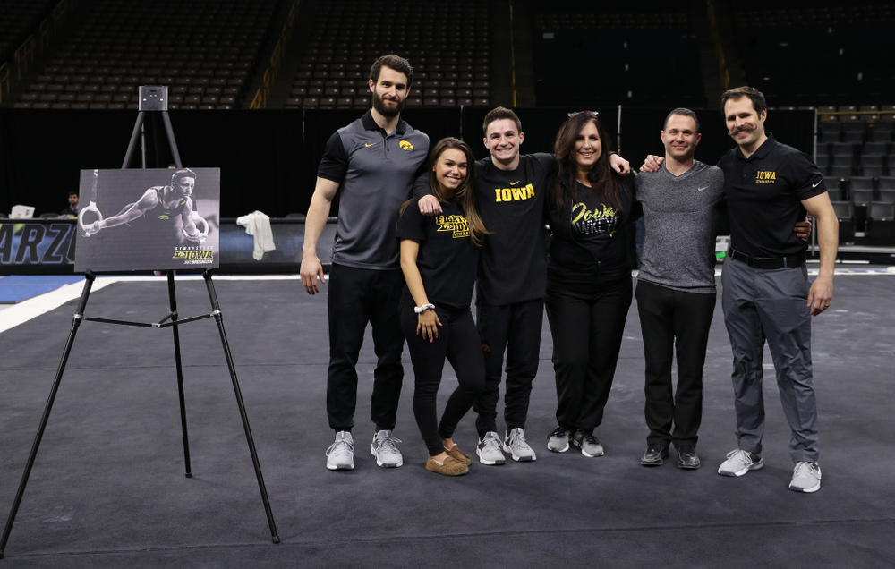 Iowa Men's Gymnast Jake Brodarzon and his family during senior day ceremonies following their meet against the Ohio State Buckeyes Saturday, March 16, 2019 at Carver-Hawkeye Arena. (Brian Ray/hawkeyesports.com)