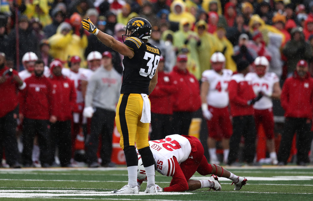 Iowa Hawkeyes to tight end T.J. Hockenson (38) signals for a first down after making a catch on fourth and eight against the Nebraska Cornhuskers Friday, November 23, 2018 at Kinnick Stadium. (Brian Ray/hawkeyesports.com)