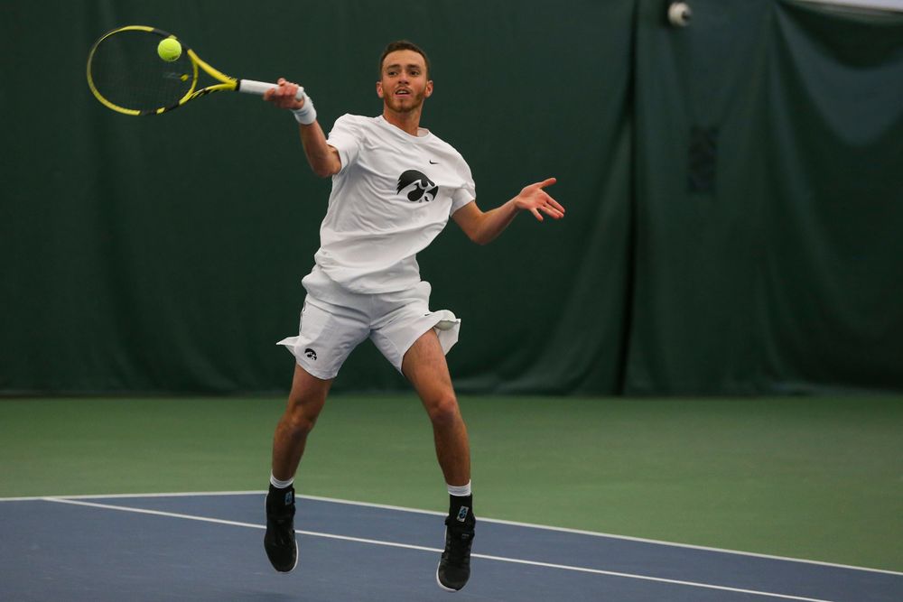 Iowa’s Kareem Allaf hits a forehand during the Iowa men’s tennis match vs Western Michigan on Saturday, January 18, 2020 at the Hawkeye Tennis and Recreation Complex. (Lily Smith/hawkeyesports.com)