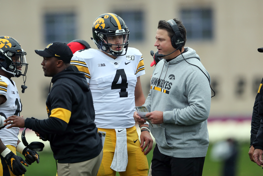 Iowa Hawkeyes quarterback Nate Stanley (4) and offensive coordinator Brian Ferentz against the Northwestern Wildcats Saturday, October 26, 2019 at Ryan Field in Evanston, Ill. (Brian Ray/hawkeyesports.com)