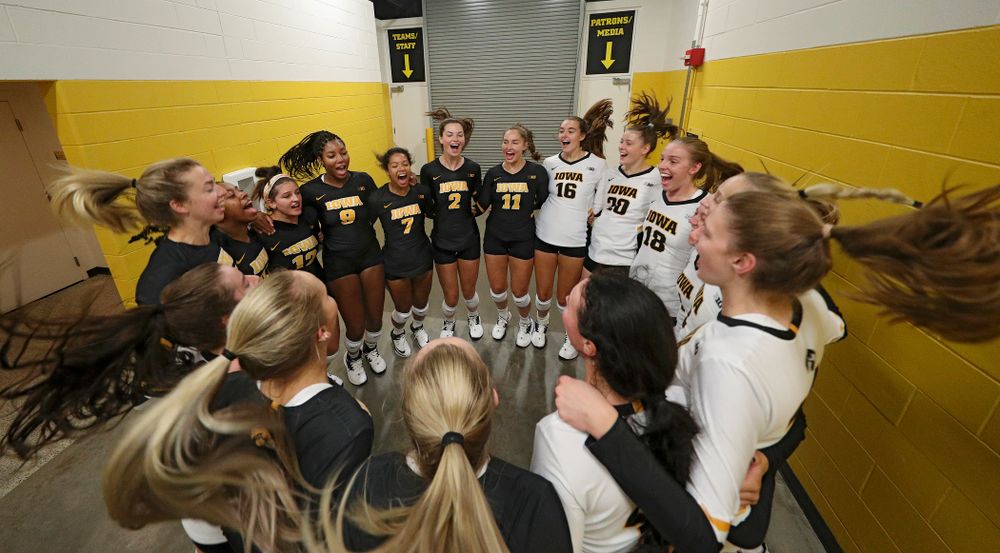 The Hawkeyes huddle before the Black and Gold scrimmage at Carver-Hawkeye Arena in Iowa City on Saturday, Aug 24, 2019. (Stephen Mally/hawkeyesports.com)