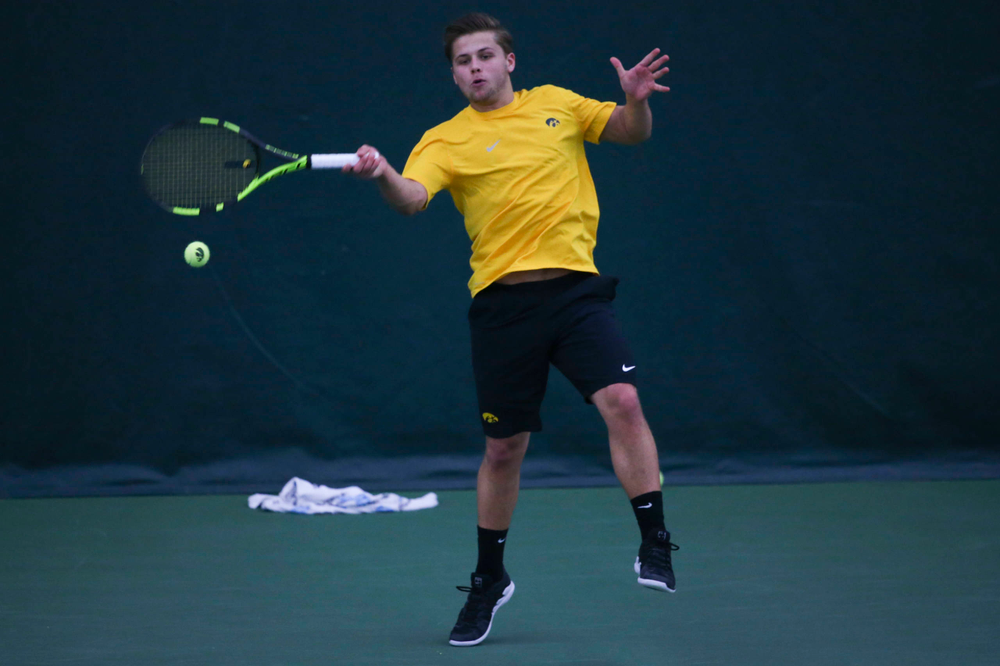 Iowa's Will Davies at a tennis match vs Drake Friday, March 8, 2019 at the Hawkeye Tennis and Recreation Complex. (Lily Smith/hawkeyesports.com)
