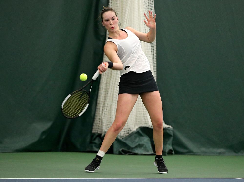 Iowa’s Samantha Mannix returns a shot during her singles match at the Hawkeye Tennis and Recreation Complex in Iowa City on Sunday, February 23, 2020. (Stephen Mally/hawkeyesports.com)