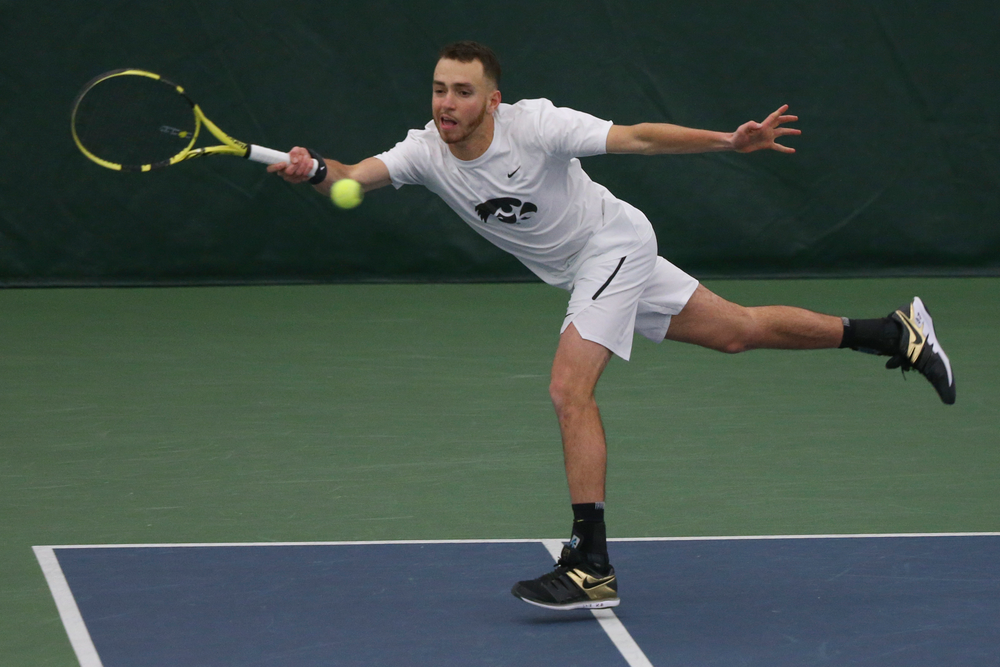 Iowa’s Kareem Allaf returns a hit during the Iowa men’s tennis meet vs Nebraska on Sunday, March 1, 2020 at the Hawkeye Tennis and Recreation Complex. (Lily Smith/hawkeyesports.com)