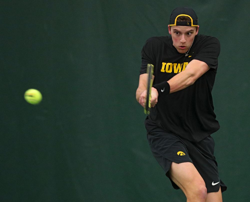Iowa’s Joe Tyler returns a shot during his singles match at the Hawkeye Tennis and Recreation Complex in Iowa City on Friday, March 6, 2020. (Stephen Mally/hawkeyesports.com)