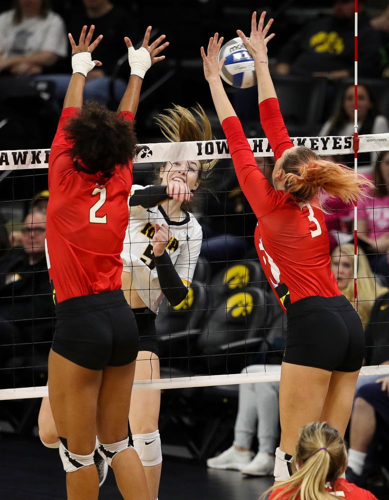 Iowa Hawkeyes outside hitter Meghan Buzzerio (5) spikes the ball during a match against Maryland at Carver-Hawkeye Arena on November 23, 2018. (Tork Mason/hawkeyesports.com)
