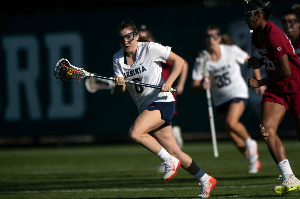 STANFORD, California - FEBRUARY 14: Virginia Cavaliers midfield/defense Gwin Sinnott (6) runs up field against the Stanford Cardinal during the first half at Cagan Stadium on February 14, 2020 in Stanford, California. The Virginia Cavaliers defeated the Stanford Cardinal 12-11. (Photo by Jason O. Watson)