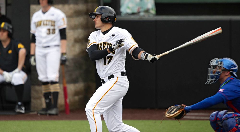 Iowa shortstop Dylan Nedved (17) hits an RBI double during the fourth inning of their college baseball game at Duane Banks Field in Iowa City on Wednesday, March 11, 2020. (Stephen Mally/hawkeyesports.com)