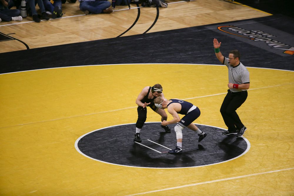 Iowa’s Spencer Lee wrestles Penn State’s Brandon Meredith during their 125 lbs match during the Iowa wrestling dual vs Penn State on Friday, January 31, 2020 at Carver-Hawkeye Arena. (Lily Smith/hawkeyesports.com)