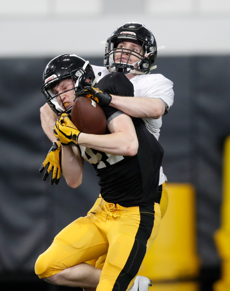 Iowa Hawkeyes wide receiver Drew Thomas (41) and defensive back John Milani (18) during spring practice Thursday, March 29, 2018 at the Hansen Football Performance Center. (Brian Ray/hawkeyesports.com)