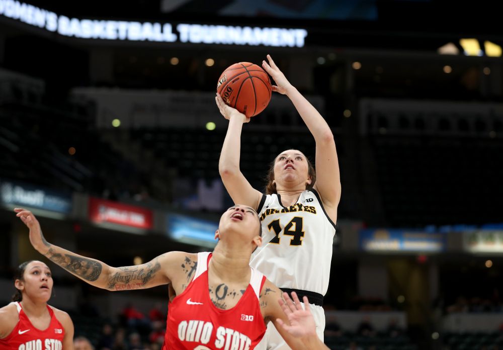 Iowa Hawkeyes forward McKenna Warnock (14) against Ohio State in the quarterfinals of the Big Ten Basketball Tournament Friday, March 6, 2020 at Bankers Life Fieldhouse in Indianapolis. (Brian Ray/hawkeyesports.com)