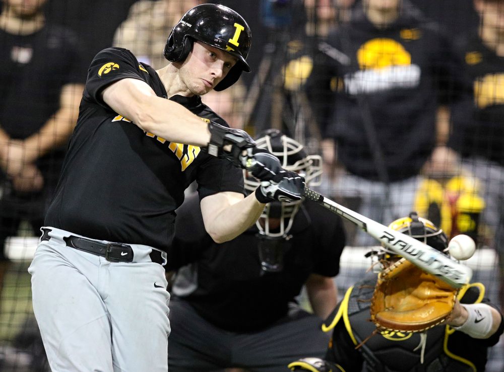 Iowa Hawkeyes pitcher/outfielder Trenton Wallace (38) bats during practice at the Hansen Football Performance Center in Iowa City on Friday, January 24, 2020. (Stephen Mally/hawkeyesports.com)