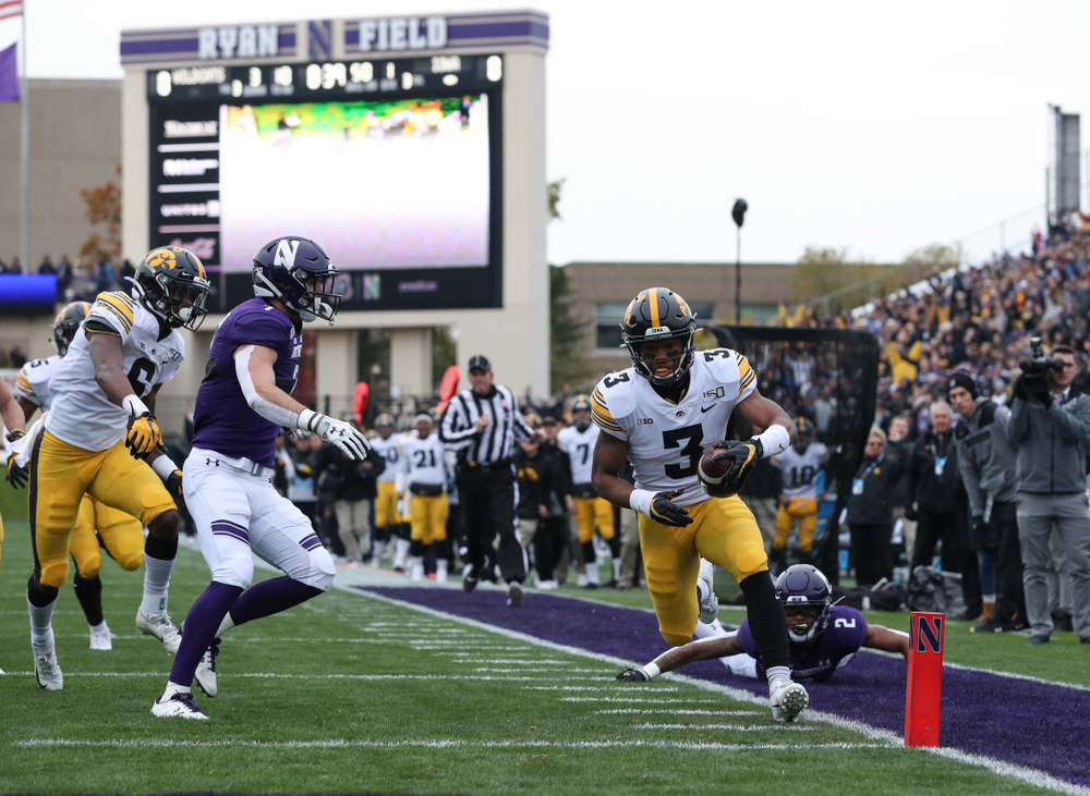 Iowa Hawkeyes wide receiver Tyrone Tracy Jr. (3) carries the ball on his way to a touchdown against the Northwestern Wildcats Saturday, October 26, 2019 at Ryan Field in Evanston, Ill. (Brian Ray/hawkeyesports.com)