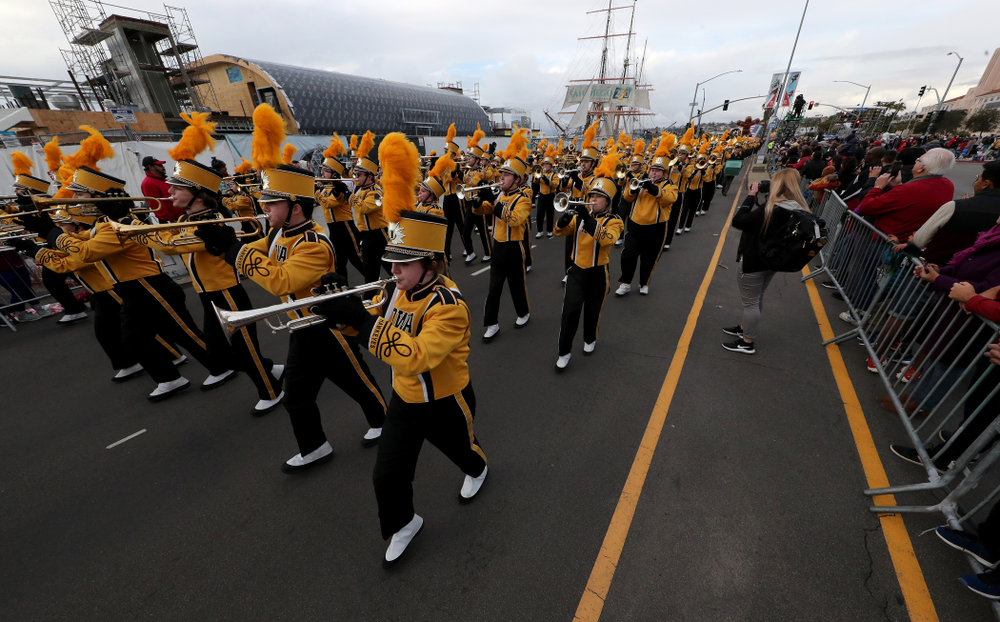 The Hawkeye Marching Band and the Iowa Spirit Squad march in the Holiday Bowl Parade Thursday, December 26, 2019 in San Diego. (Brian Ray/hawkeyesports.com)
