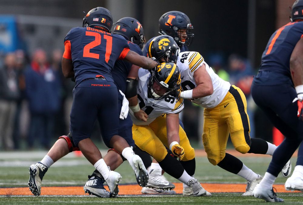 Iowa Hawkeyes defensive lineman Brady Reiff (91) and linebacker Jack Hockaday (48) against the Illinois Fighting Illini Saturday, November 17, 2018 at Memorial Stadium in Champaign, Ill. (Brian Ray/hawkeyesports.com)