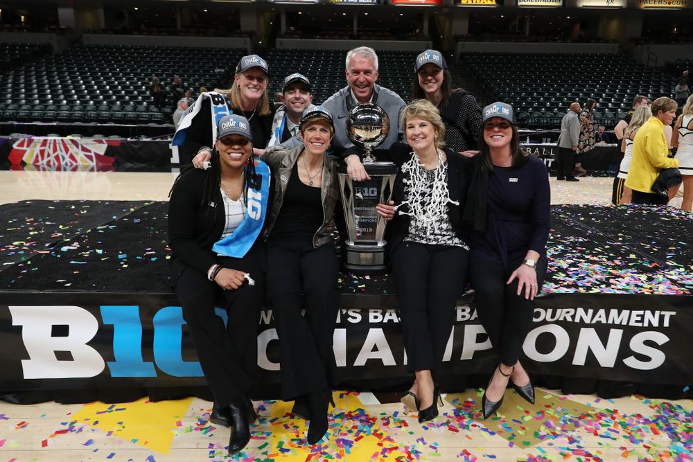 The Iowa Women's Basketball Coaching Staff with athletics director Gary Barta against the Maryland Terrapins Sunday, March 10, 2019 at Bankers Life Fieldhouse in Indianapolis, Ind. (Brian Ray/hawkeyesports.com)