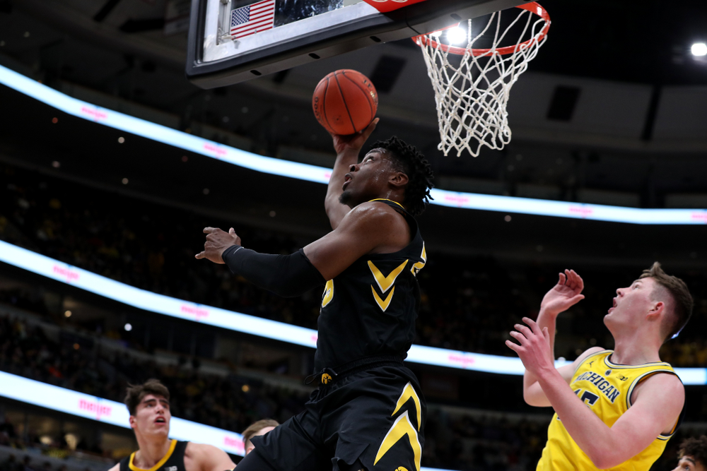 Iowa Hawkeyes forward Tyler Cook (25) against the Michigan Wolverines in the 2019 Big Ten Men's Basketball Tournament Friday, March 15, 2019 at the United Center in Chicago. (Brian Ray/hawkeyesports.com)