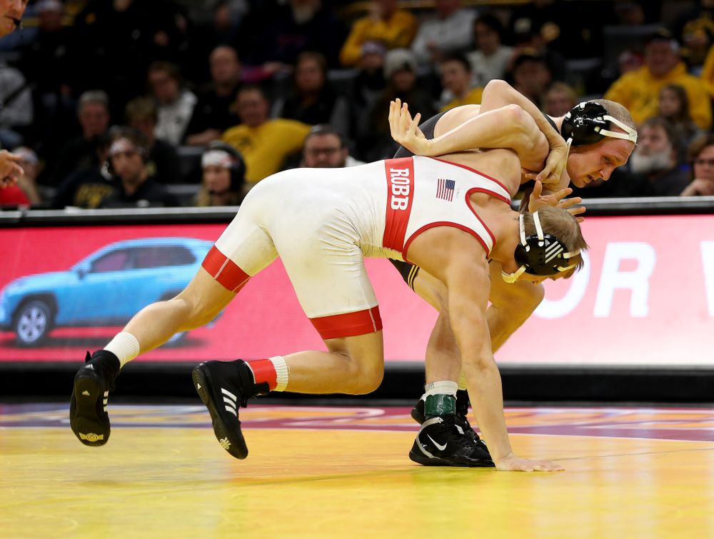 Iowa’s Kaleb Young wrestles Nebraska’s Peyton Rob at 157 pounds Saturday, January 18, 2020 at Carver-Hawkeye Arena. Young won the match 6-4. (Brian Ray/hawkeyesports.com)