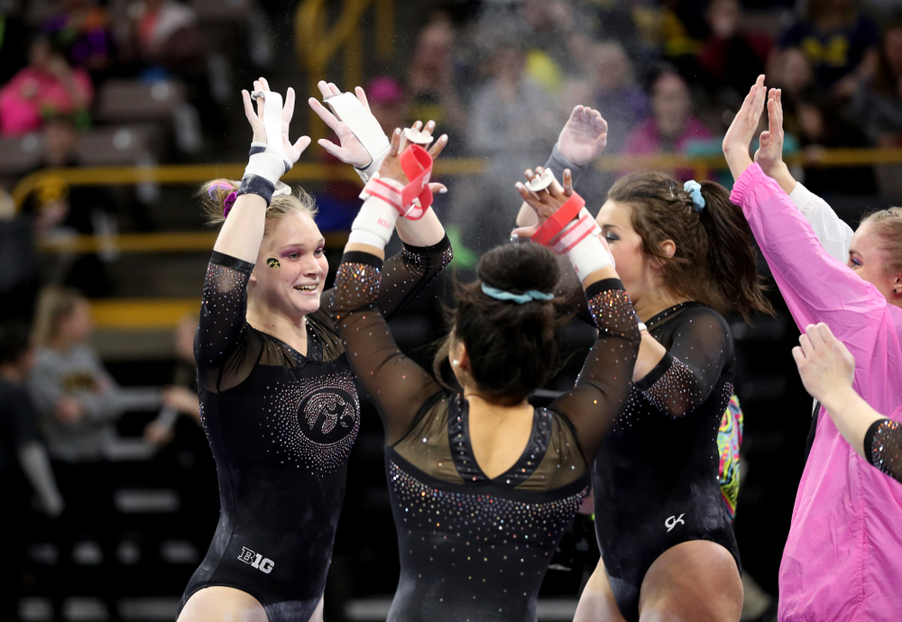 Iowa’s Allyson Steffensmeier competes on the bars against Michigan Friday, February 14, 2020 at Carver-Hawkeye Arena. (Brian Ray/hawkeyesports.com)