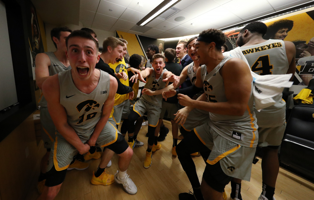 The Iowa Hawkeyes celebrate their victory against the Iowa State Cyclones in the Iowa Corn Cy-Hawk Series Thursday, December 6, 2018 at Carver-Hawkeye Arena. (Brian Ray/hawkeyesports.com)