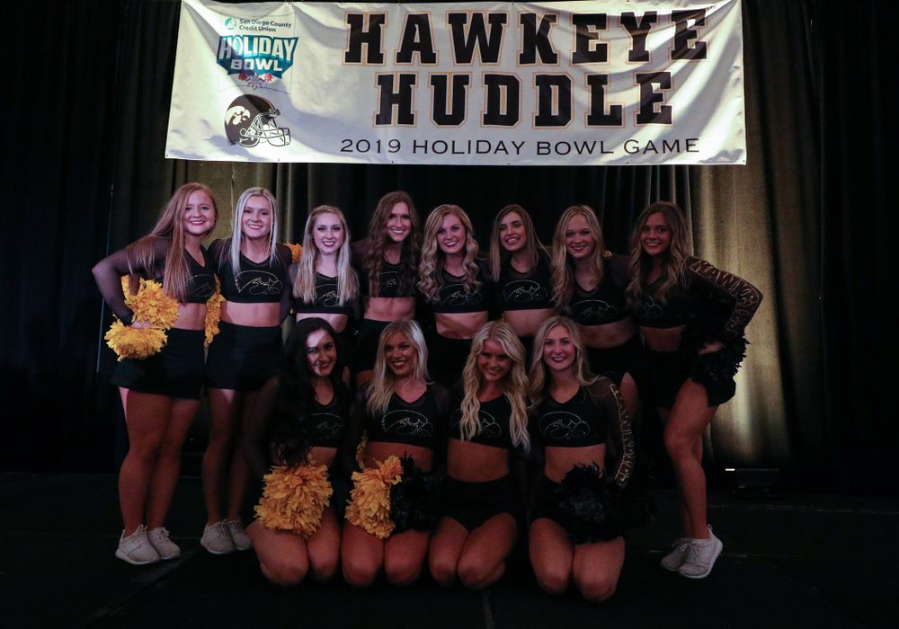 The Hawkeye Marching Band and the Iowa Spirit Squads perform during the Holiday Bowl Hawkeye Huddle Thursday, December 26, 2019 at the Hilton in downtown San Diego. (Brian Ray/hawkeyesports.com)