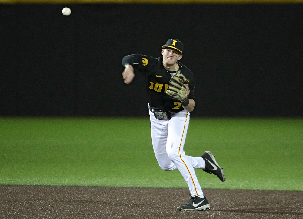 Iowa infielder Brendan Sher (2) throws to first for an out during the eighth inning of their game at Duane Banks Field in Iowa City on Tuesday, March 3, 2020. (Stephen Mally/hawkeyesports.com)