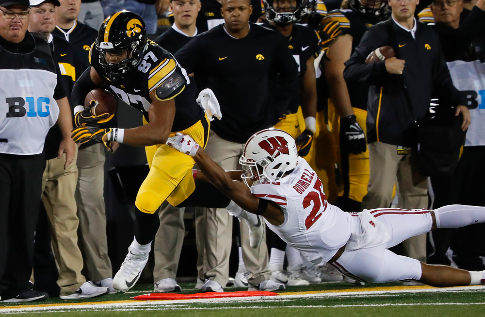 Iowa Hawkeyes tight end Noah Fant (87) is run out of bounds after making a first down reception during a game against Wisconsin at Kinnick Stadium on September 22, 2018. (Tork Mason/hawkeyesports.com)
