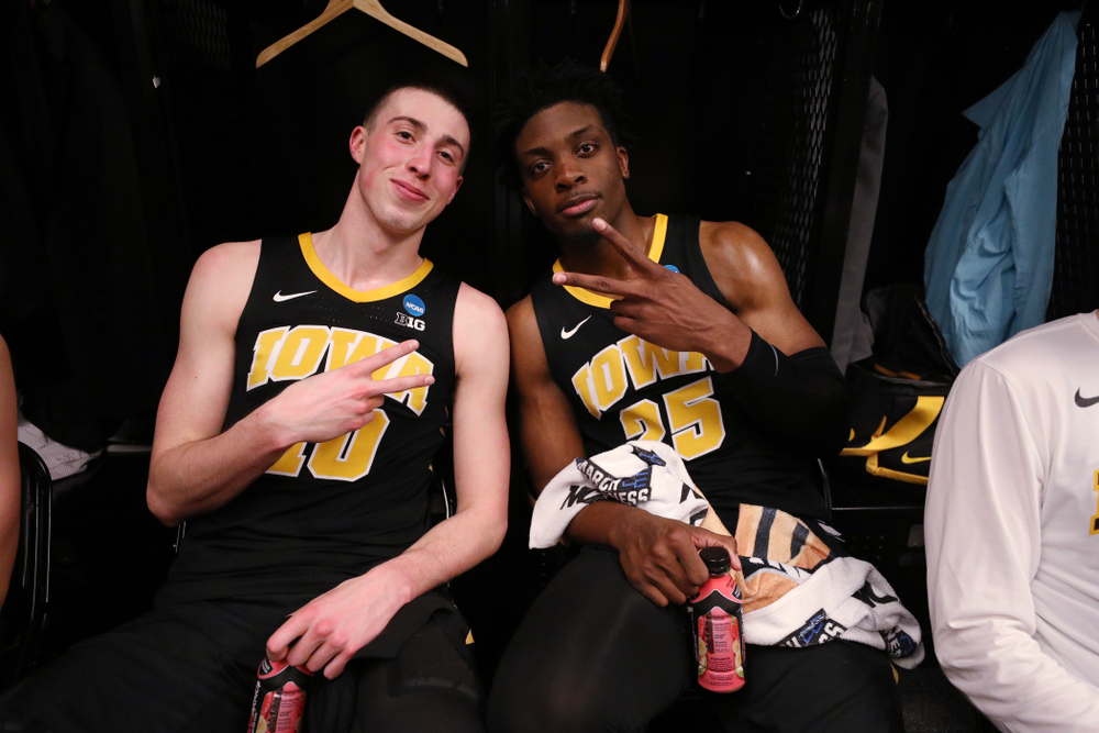 Iowa Hawkeyes guard Joe Wieskamp (10) and forward Tyler Cook (25) against the Cincinnati Bearcats in the first round of the 2019 NCAA Men's Basketball Tournament Friday, March 22, 2019 at Nationwide Arena in Columbus, Ohio. (Brian Ray/hawkeyesports.com)