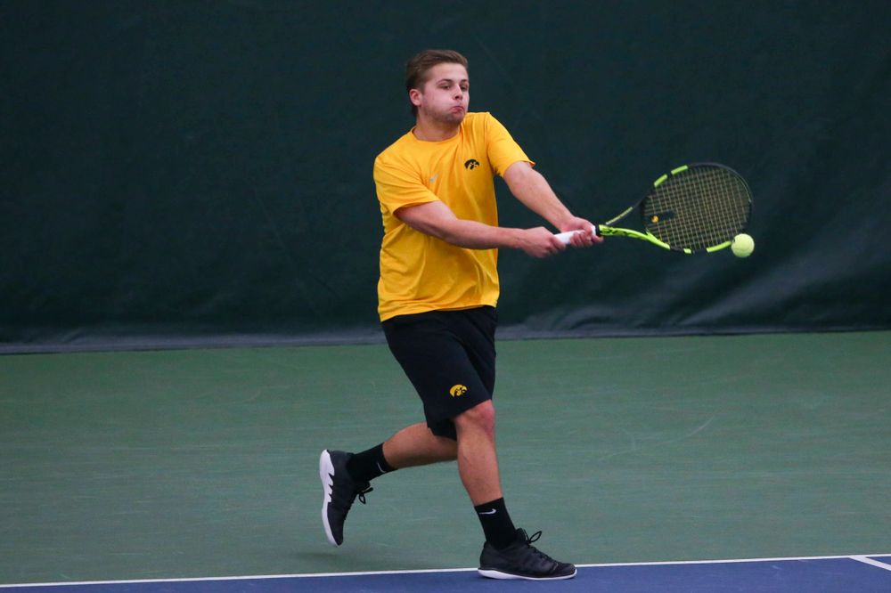 Iowa's Will Davies at a tennis match vs Drake Friday, March 8, 2019 at the Hawkeye Tennis and Recreation Complex. (Lily Smith/hawkeyesports.com)