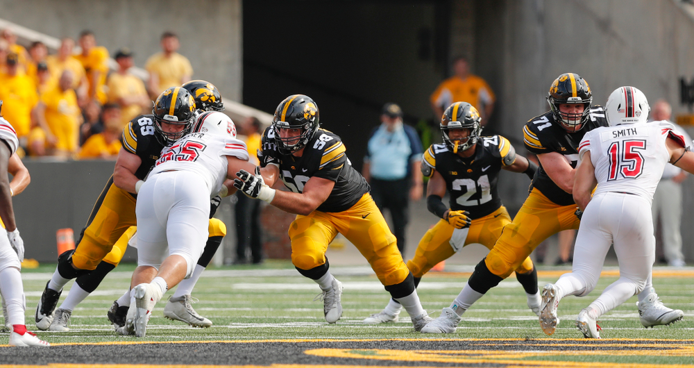 Iowa Hawkeyes offensive lineman Keegan Render (69), offensive lineman Ross Reynolds (59), and offensive lineman Mark Kallenberger (71) against the Northern Illinois Huskies Saturday, September 1, 2018 at Kinnick Stadium. (Brian Ray/hawkeyesports.com)