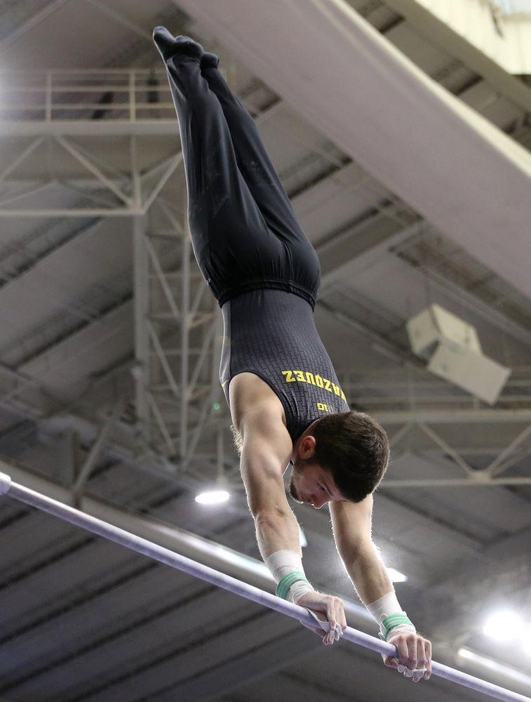 Iowa's Rogelio Vazquez competes on the high bar against the Ohio State Buckeyes Saturday, March 16, 2019 at Carver-Hawkeye Arena. (Brian Ray/hawkeyesports.com)