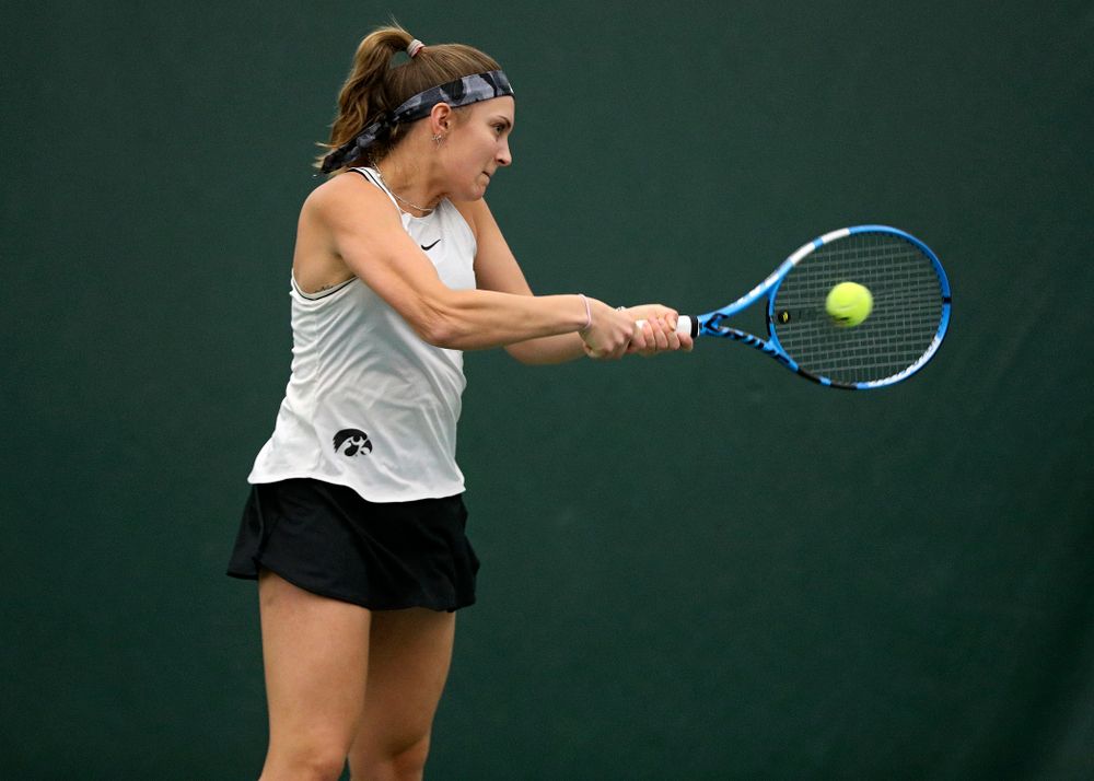 Iowa’s Ashleigh Jacobs returns a shot during her doubles match at the Hawkeye Tennis and Recreation Complex in Iowa City on Sunday, February 16, 2020. (Stephen Mally/hawkeyesports.com)