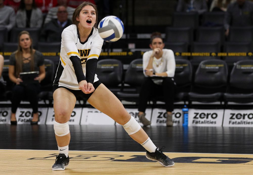 Iowa Hawkeyes defensive specialist Emily Bushman (12) bumps the ball during a match against Nebraska at Carver-Hawkeye Arena on November 7, 2018. (Tork Mason/hawkeyesports.com)