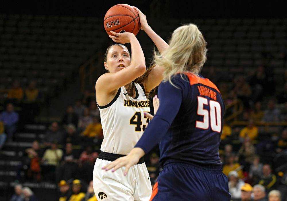 Iowa Hawkeyes forward Amanda Ollinger (43) makes a basket during the first quarter of their game at Carver-Hawkeye Arena in Iowa City on Tuesday, December 31, 2019. (Stephen Mally/hawkeyesports.com)