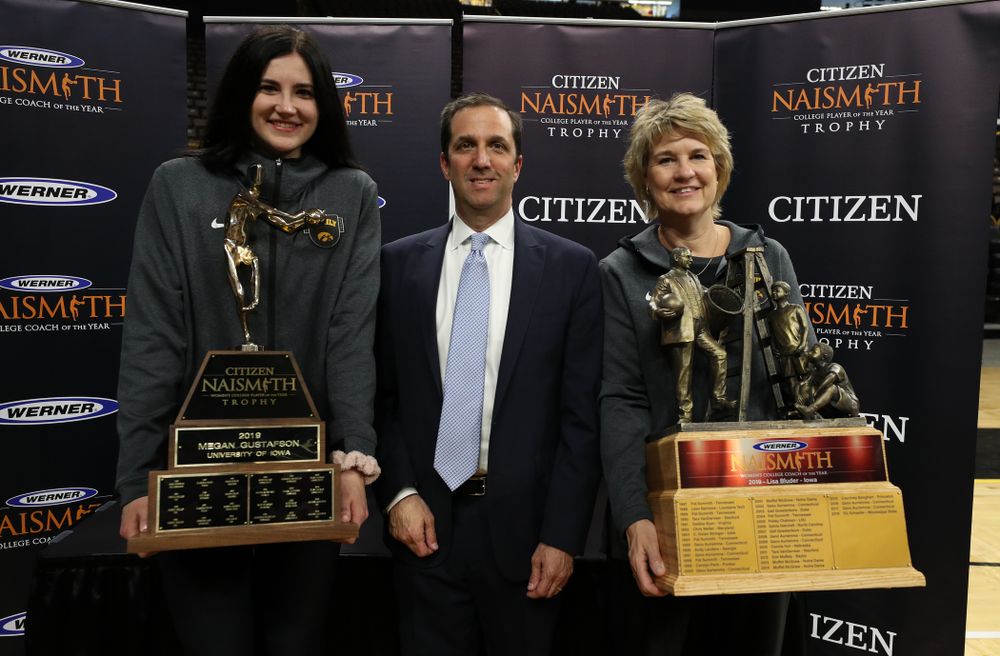 Iowa Hawkeyes forward Megan Gustafson (10) with the Naismith Player Of The Year Trophy and head coach Lisa Bluder with the Naismith Coach Of the Year Trophy during the teamÕs Celebr-Eight event Wednesday, April 24, 2019 at Carver-Hawkeye Arena. (Brian Ray/hawkeyesports.com)