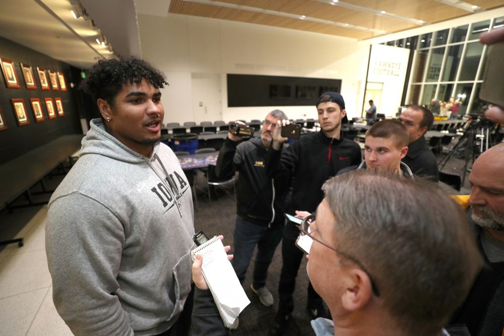 Iowa Hawkeyes offensive lineman Tristan Wirfs (74) answers questions from the media on the Hawkeyes selection to face USC in the 2019 Holiday Bowl Sunday, December 8, 2019 at the Hansen Football Performance Center. (Brian Ray/hawkeyesports.com)
