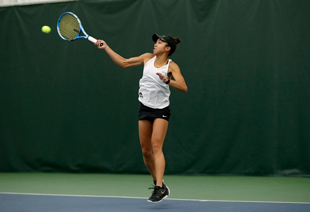 Iowa’s Michelle Bacalla returns a shot during her singles match at the Hawkeye Tennis and Recreation Complex in Iowa City on Sunday, February 23, 2020. (Stephen Mally/hawkeyesports.com)