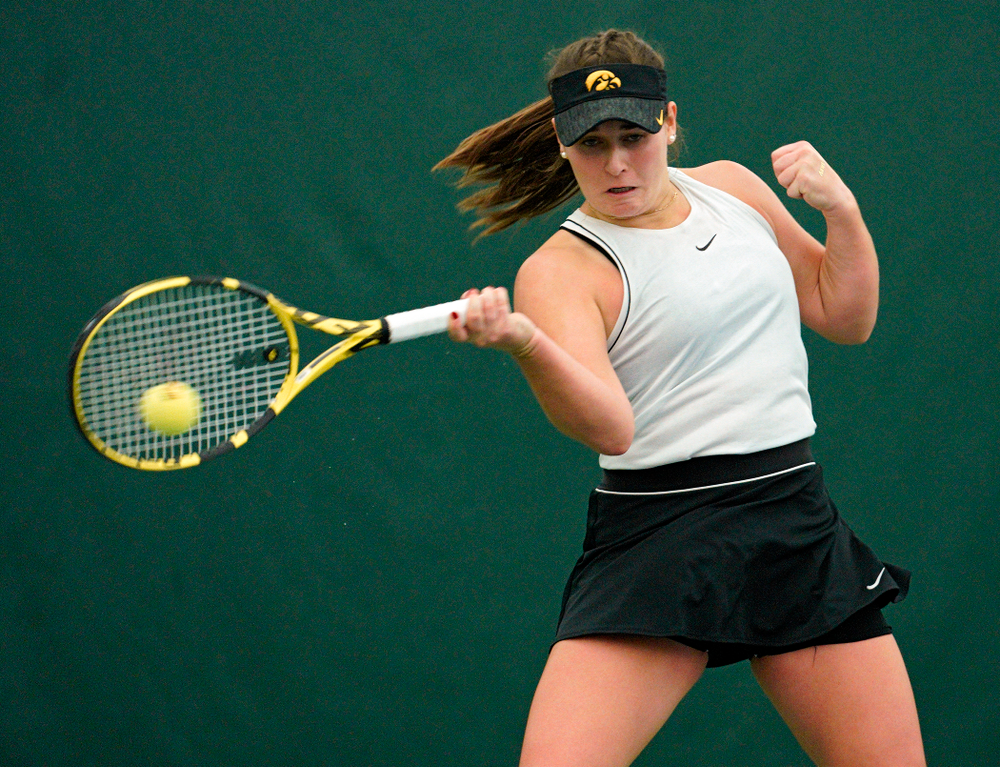 Iowa’s Danielle Bauers returns a shot during her singles match at the Hawkeye Tennis and Recreation Complex in Iowa City on Sunday, February 16, 2020. (Stephen Mally/hawkeyesports.com)