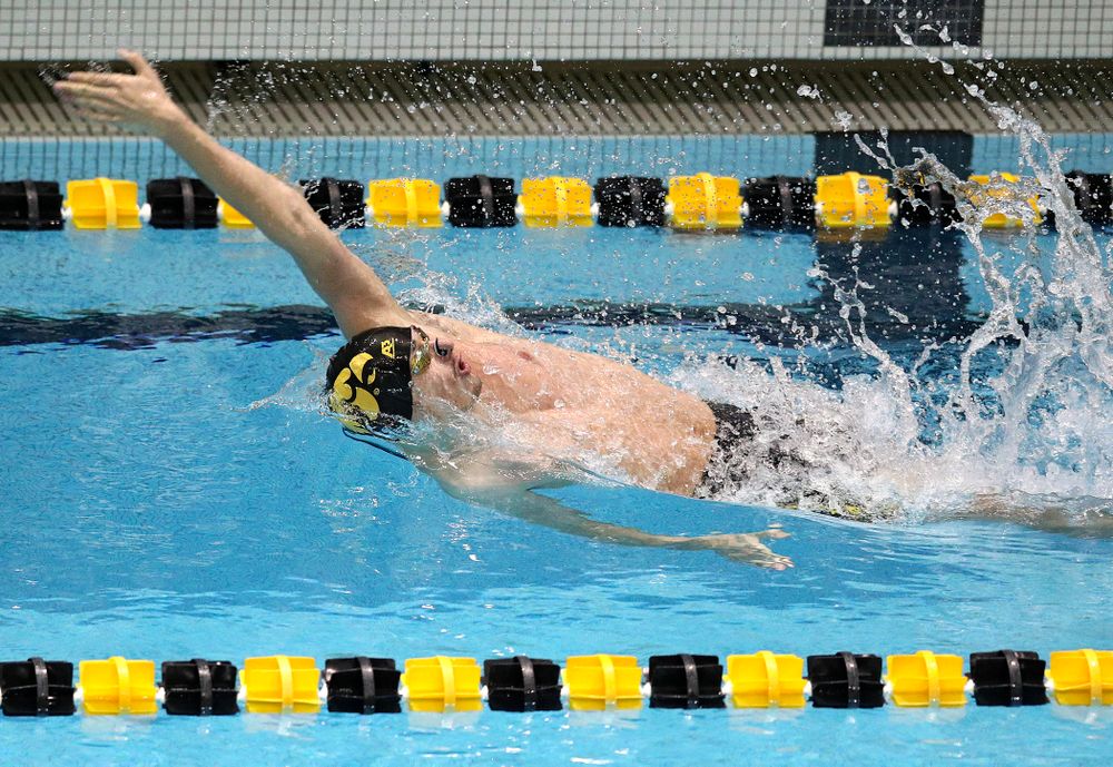 Iowa’s Will Scott swims the men’s 50 yard backstroke event during their meet at the Campus Recreation and Wellness Center in Iowa City on Friday, February 7, 2020. (Stephen Mally/hawkeyesports.com)